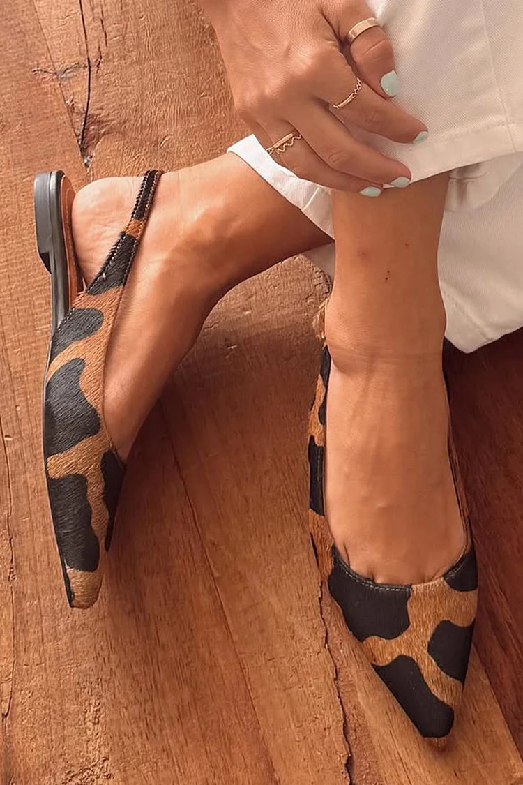 talons larges classiques slingback à bout effilé et imprimé vache.