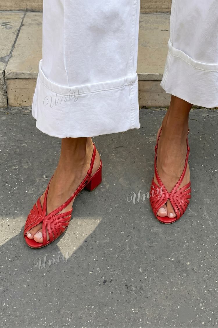 sandales slingback tressées métallisées or rose à bout ouvert et talon haut.