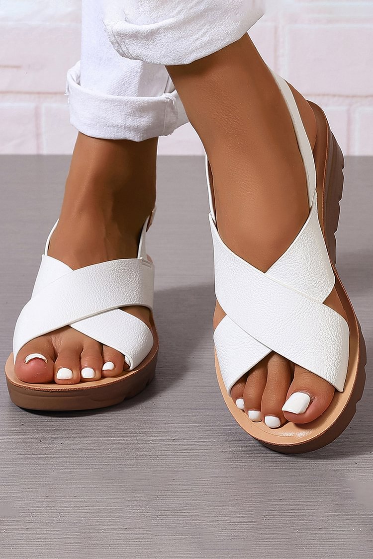 sandales compensées à bride croisée, slingback et boucle, bout ouvert.