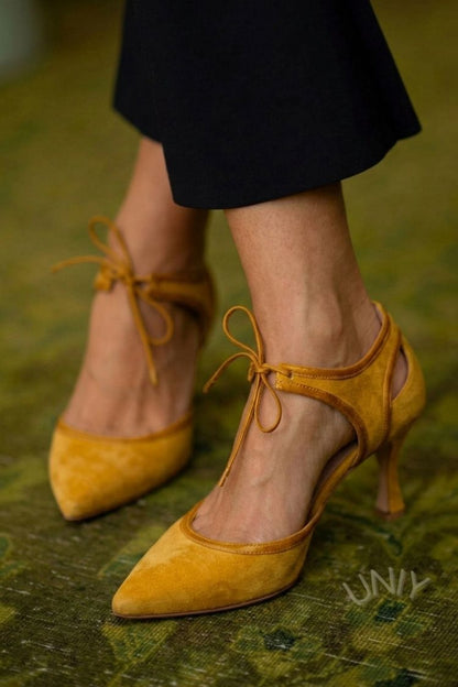 talons kitten rose en suédine à bout effilé et nœud bicolore.