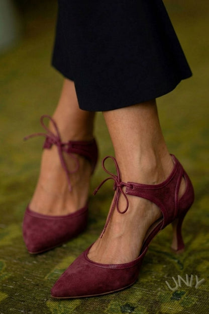 talons kitten rose en suédine à bout effilé et nœud bicolore.