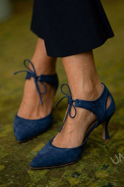 talons kitten rose en suédine à bout effilé et nœud bicolore.