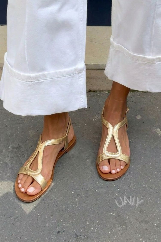 sandales plates décontractées slingback or métallisé à découpes.